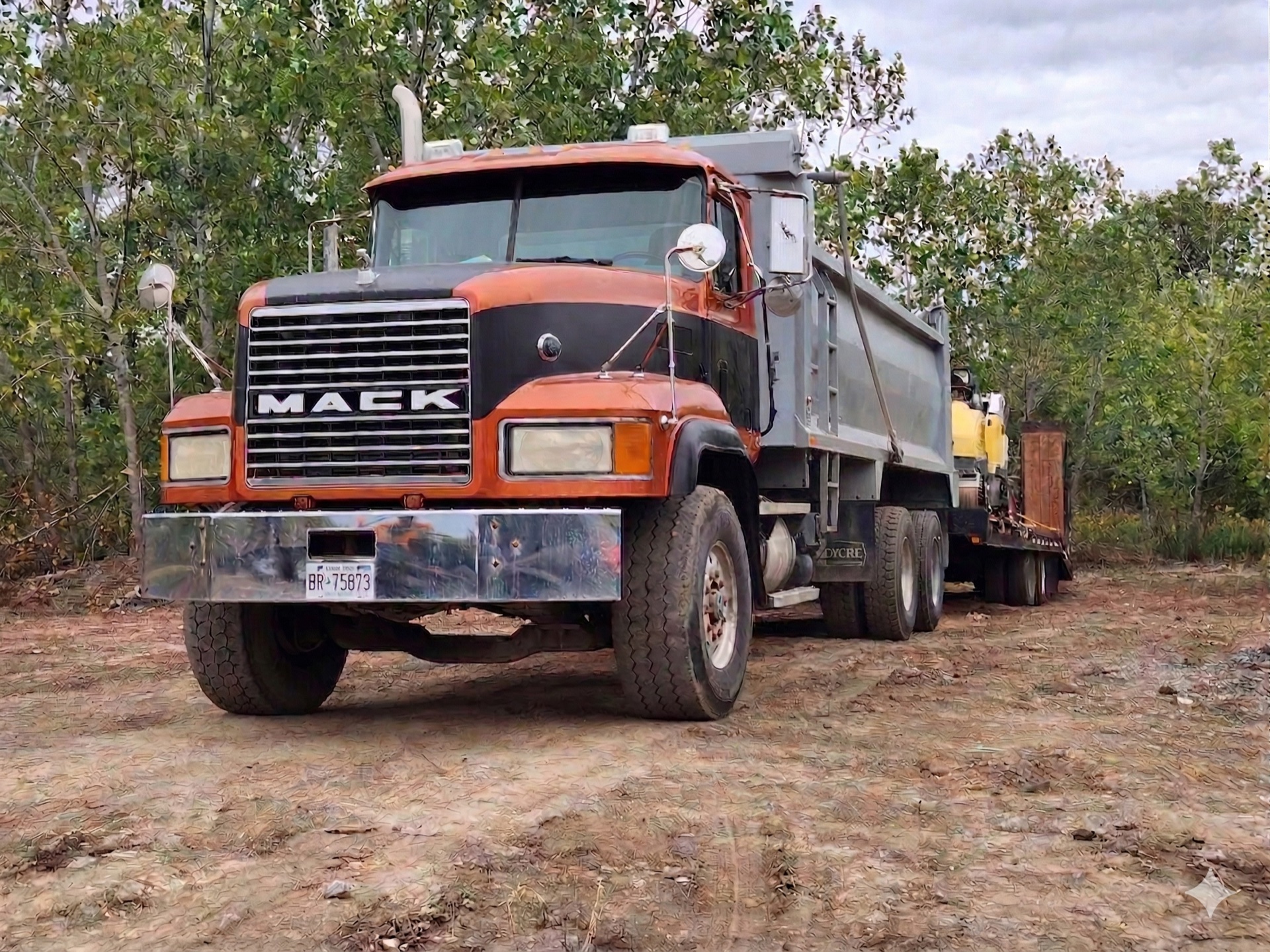 Alpha Paving Solutions truck and equipment on paving job site in Hamilton Ontario